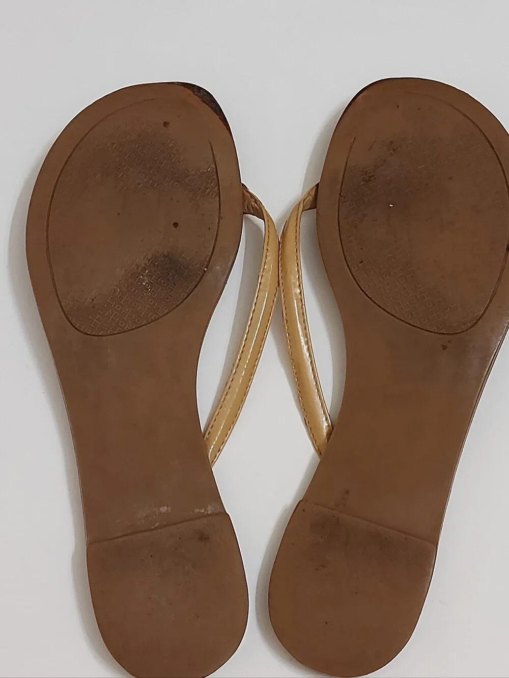 Tory Burch Brown Leather Flip Flop Sandals with Tan Straps and Gold Medallion